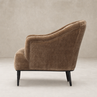 Wells Chair in Altair Mushroom showcasing a curved back and sleek black legs.