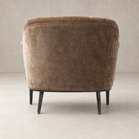 Wells Chair in Altair Mushroom with a textured fabric and sleek black legs.