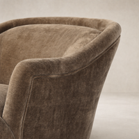 Wells Chair in Altair Mushroom featuring a smooth, curved design and rich texture.