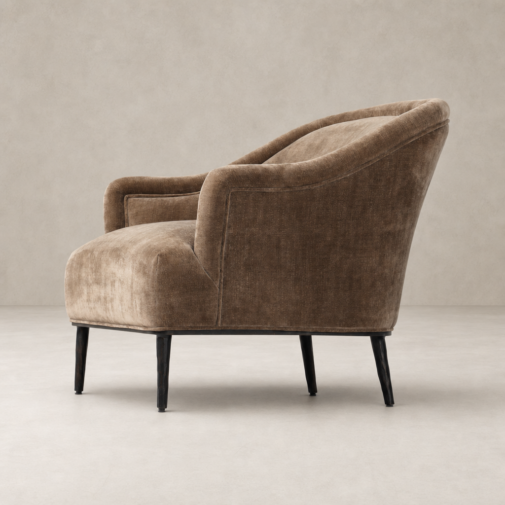 Wells Chair in Altair Mushroom features a plush, ergonomic design with sleek black legs.