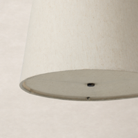 Jet black pendant light featuring a sleek, modern design with a smooth finish.