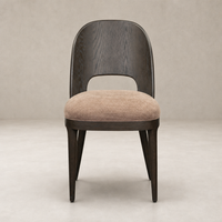 Hawthorne Dining Chair in Laughlin Cafe with a curved backrest and plush seat.
