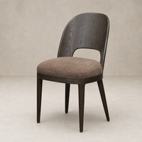 Hawthorne Dining Chair in Laughlin Cafe with a curved back and plush seat cushion.