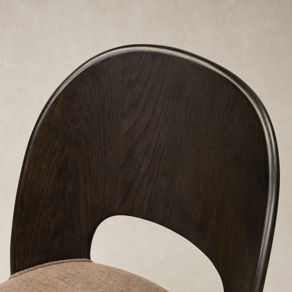 Hawthorne Dining Chair featuring a curved dark wood back and soft Laughlin Cafe upholstery.