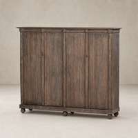 Lisbon Cabinet in distressed cocoa pine with four doors and round feet.