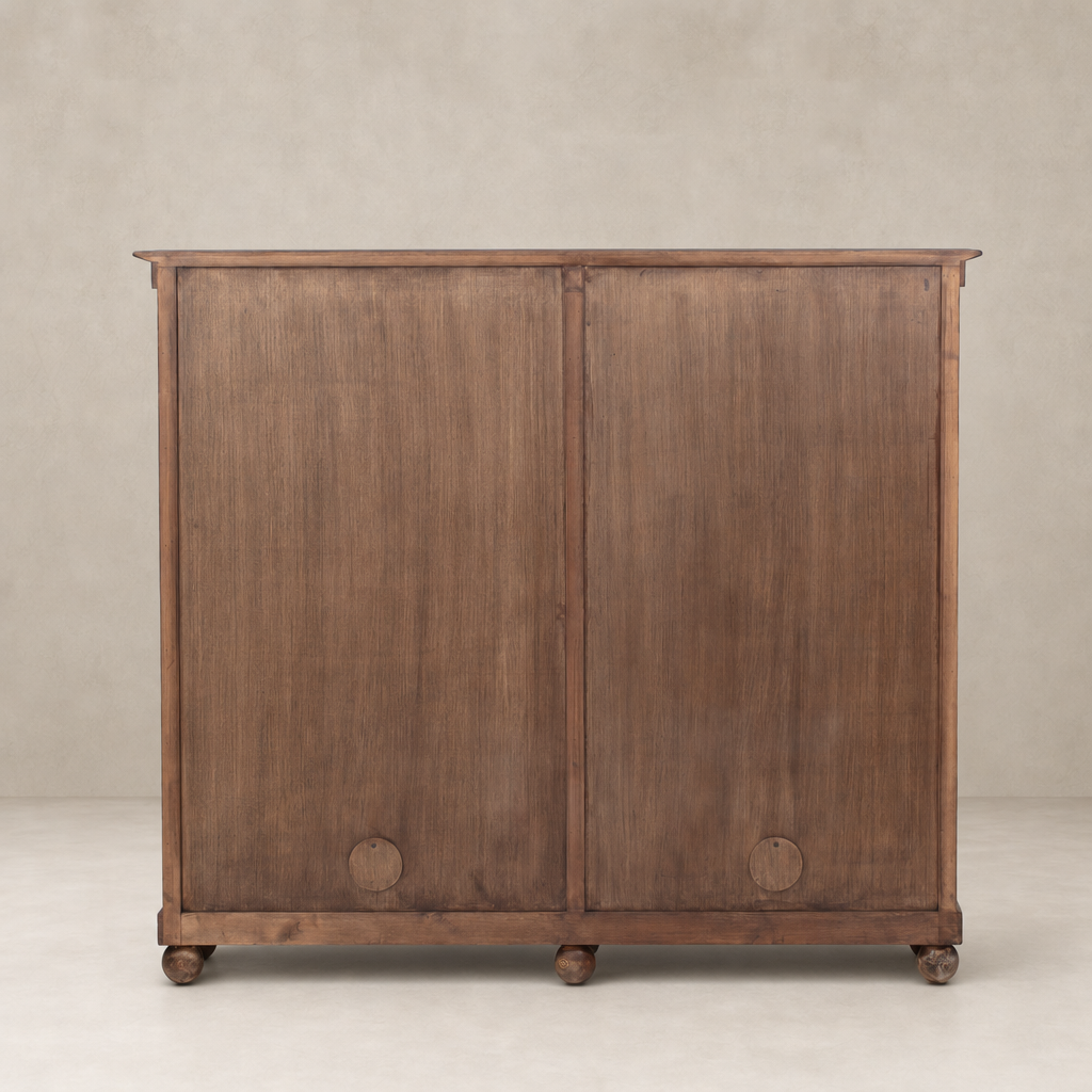 Lisbon Cabinet in distressed cocoa pine with smooth finish and rounded feet.