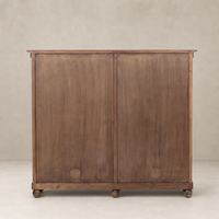 Lisbon Cabinet in distressed cocoa pine with smooth finish and rounded feet.