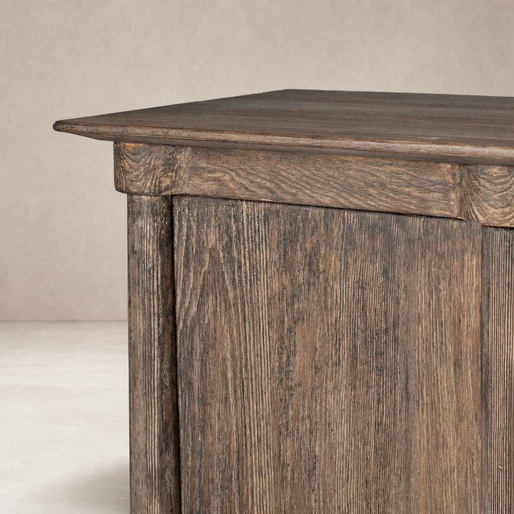 Lisbon Cabinet in distressed cocoa pine, showcasing textured wood grain and sharp edges.