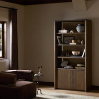 Sedona Bookcase in Tobacco Oak featuring open shelves and a sleek design.