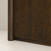 Close-up of the Sedona Bookcase in Tobacco Oak showcasing rich texture and wood grain.