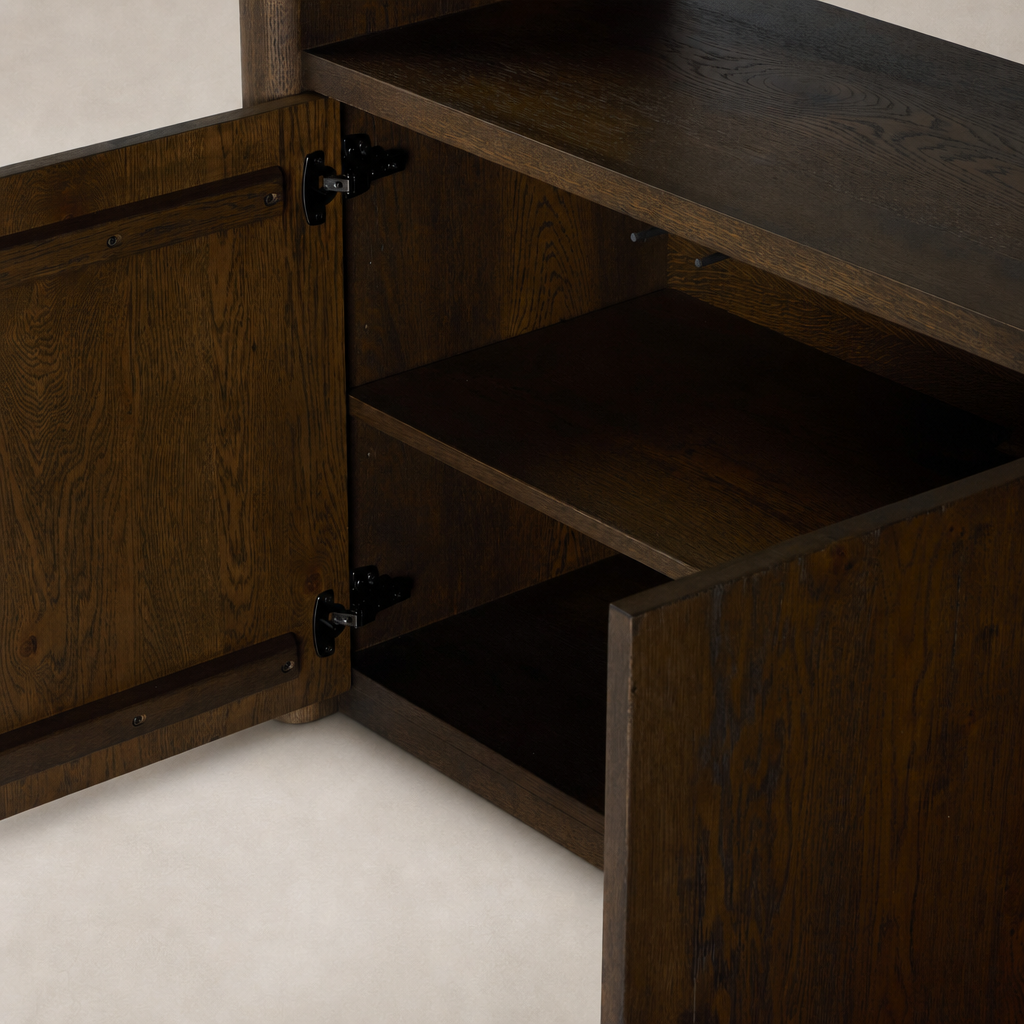 Close-up of the Sedona Bookcase in Tobacco Oak showing open doors and shelves.