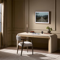 Kyoto Desk in sandy oak with curved design appeals in elegant room setting.