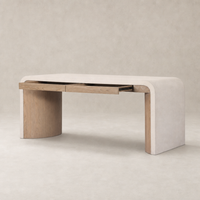 Kyoto Desk in sandy oak with smooth curves and functional drawers for modern workspaces.