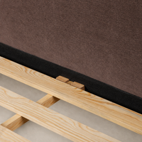 Detailed view of Laughlin Plum bed's wooden slats and soft fabric backing.