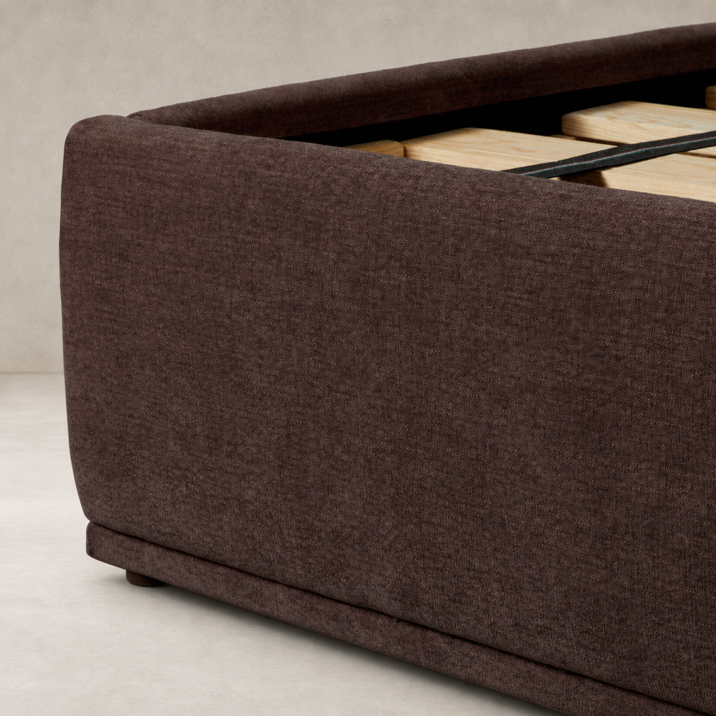 Plush Laughlin Plum bed showcasing a textured upholstery and sturdy wooden slat support.