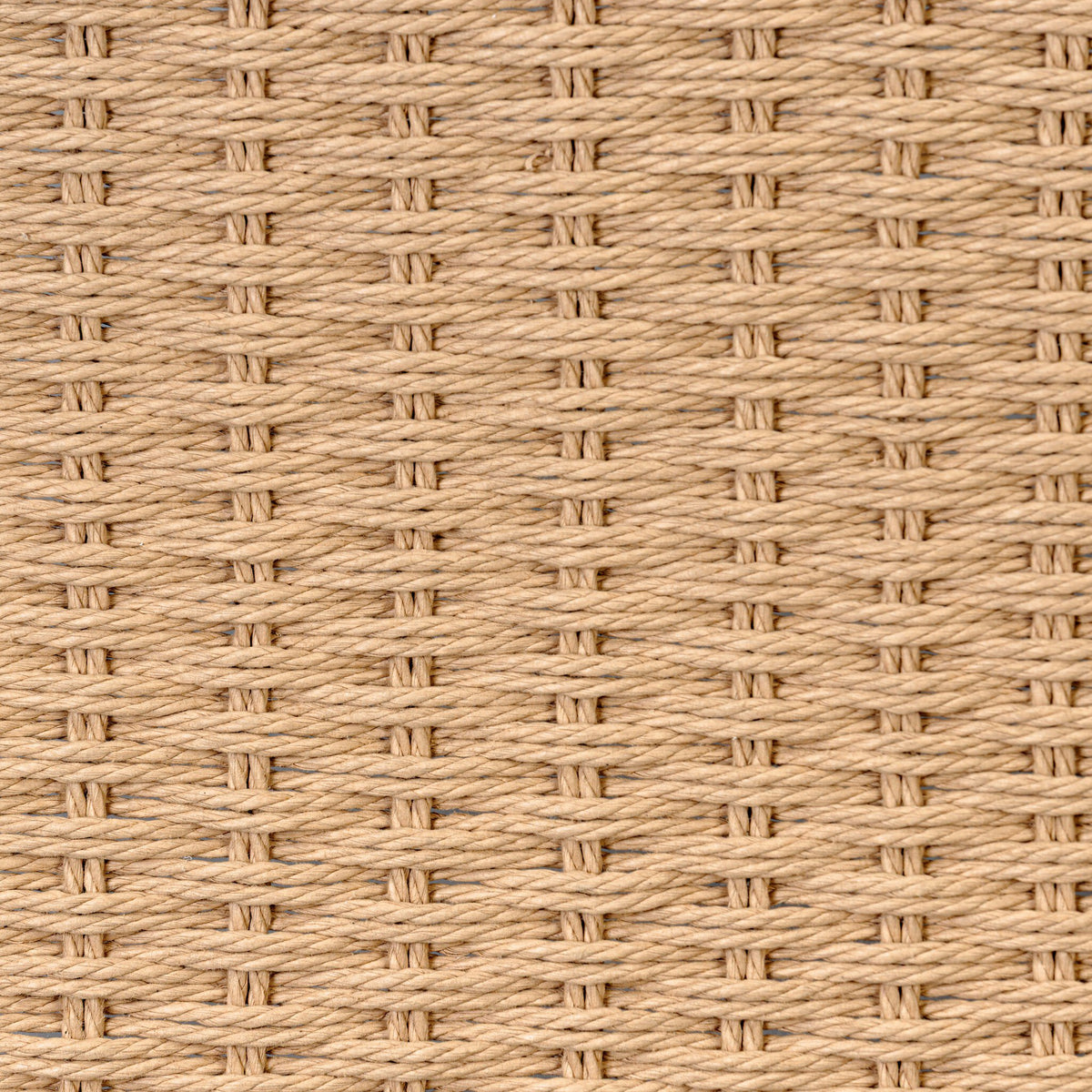 Textured close-up of woven beige material showcasing its intricate pattern.