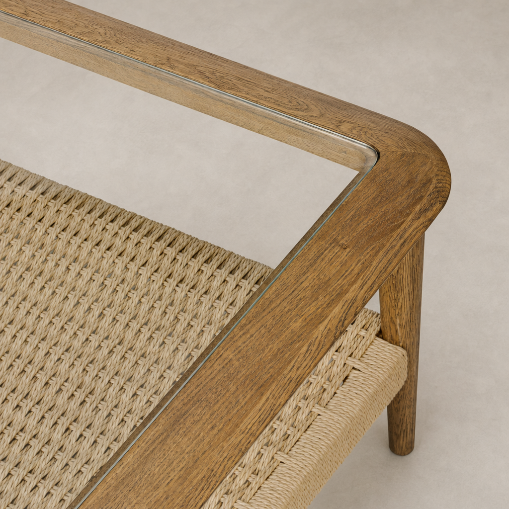Brandy Coffee Table featuring tempered glass top and woven natural fiber base.