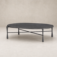 Rhea Coffee Table featuring a grey Italian marble top and sleek black legs.