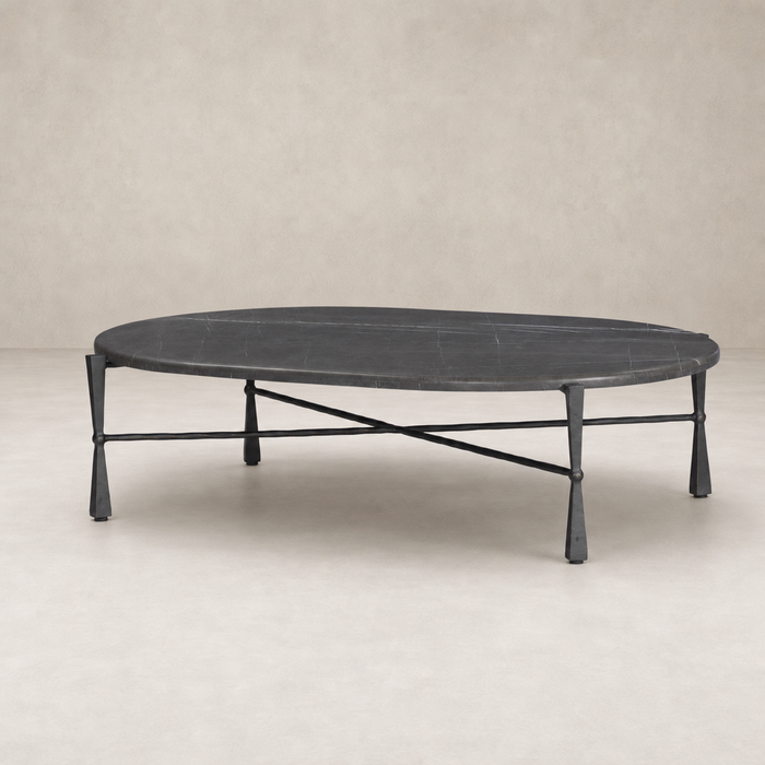 Rhea Coffee Table featuring a grey Italian marble top and sleek black legs.