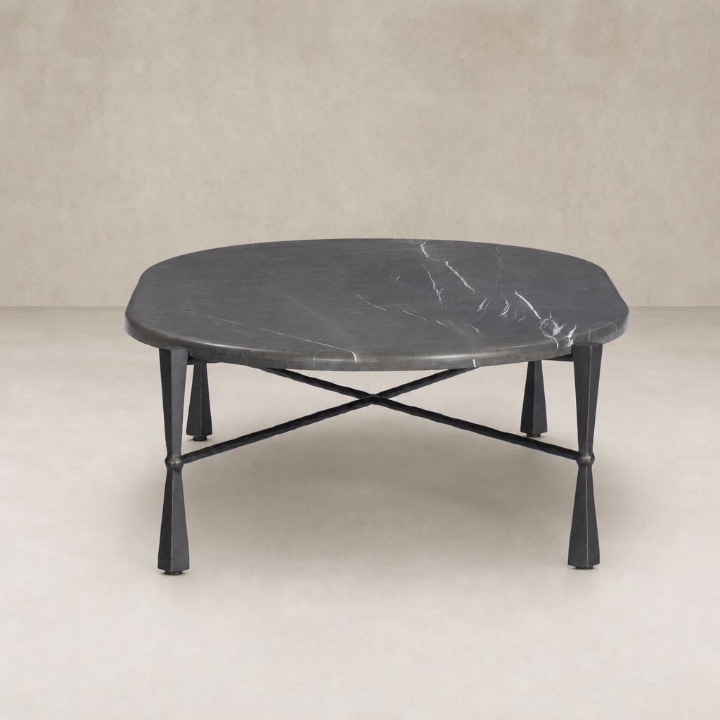 Rhea Coffee Table in grey Italian marble with elegant oval shape and sleek black metal legs.
