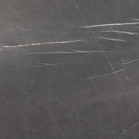 Grey Italian Marble surface of Rhea Coffee Table features elegant veining and texture.