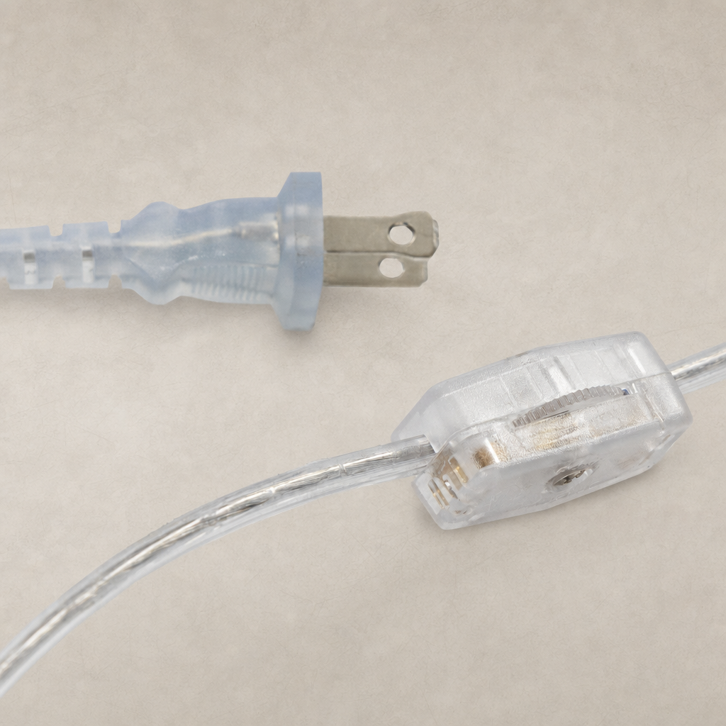 Transparent cord and plug details of a cream Italian marble table lamp.