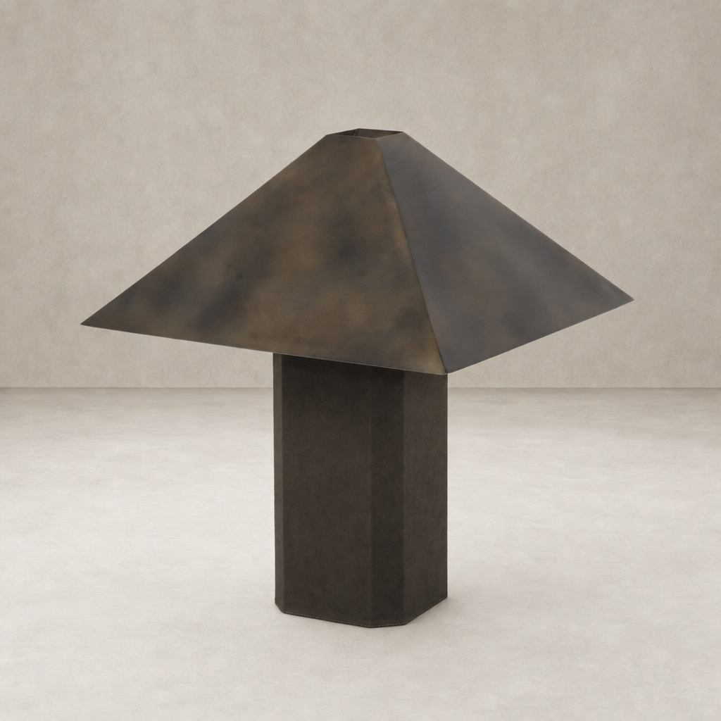 Forest green canvas table lamp with a unique geometric shade design.