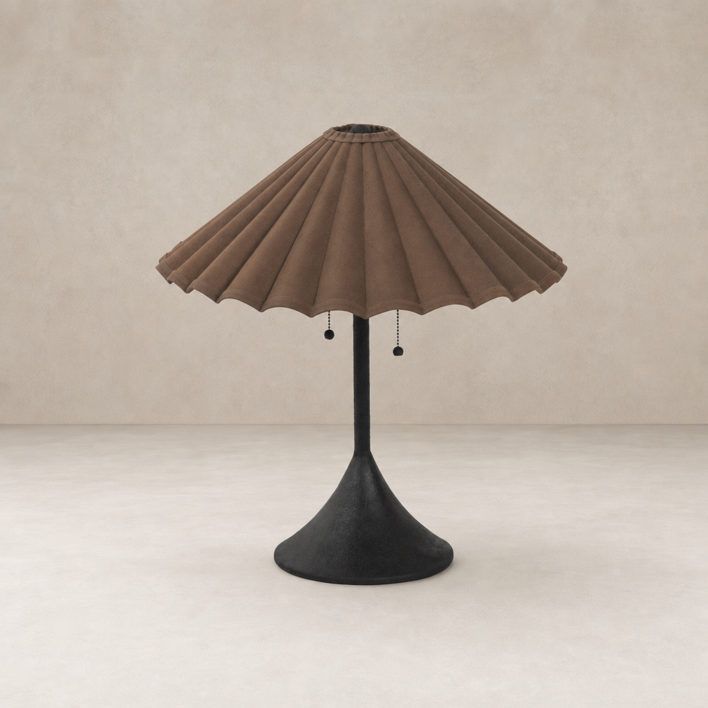 Espresso canvas table lamp with a pleated shade and slender black base.