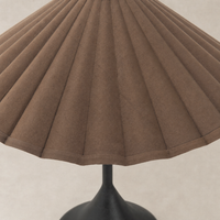 Espresso canvas table lamp with a pleated shade and black base.