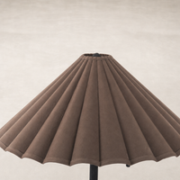 Espresso canvas floor lamp with a pleated shade detailing and elegant silhouette.
