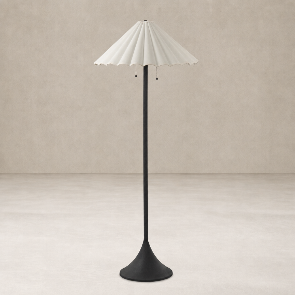 Elegant cream canvas floor lamp with a scalloped shade and sleek black base.