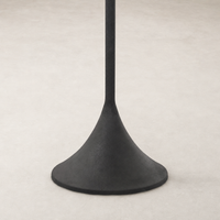 Cream canvas floor lamp with a modern, sleek design and a unique base shape.