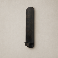 Zola Wall Mounted Candle Holder in distressed bronze with sleek, elongated design and candle cup.