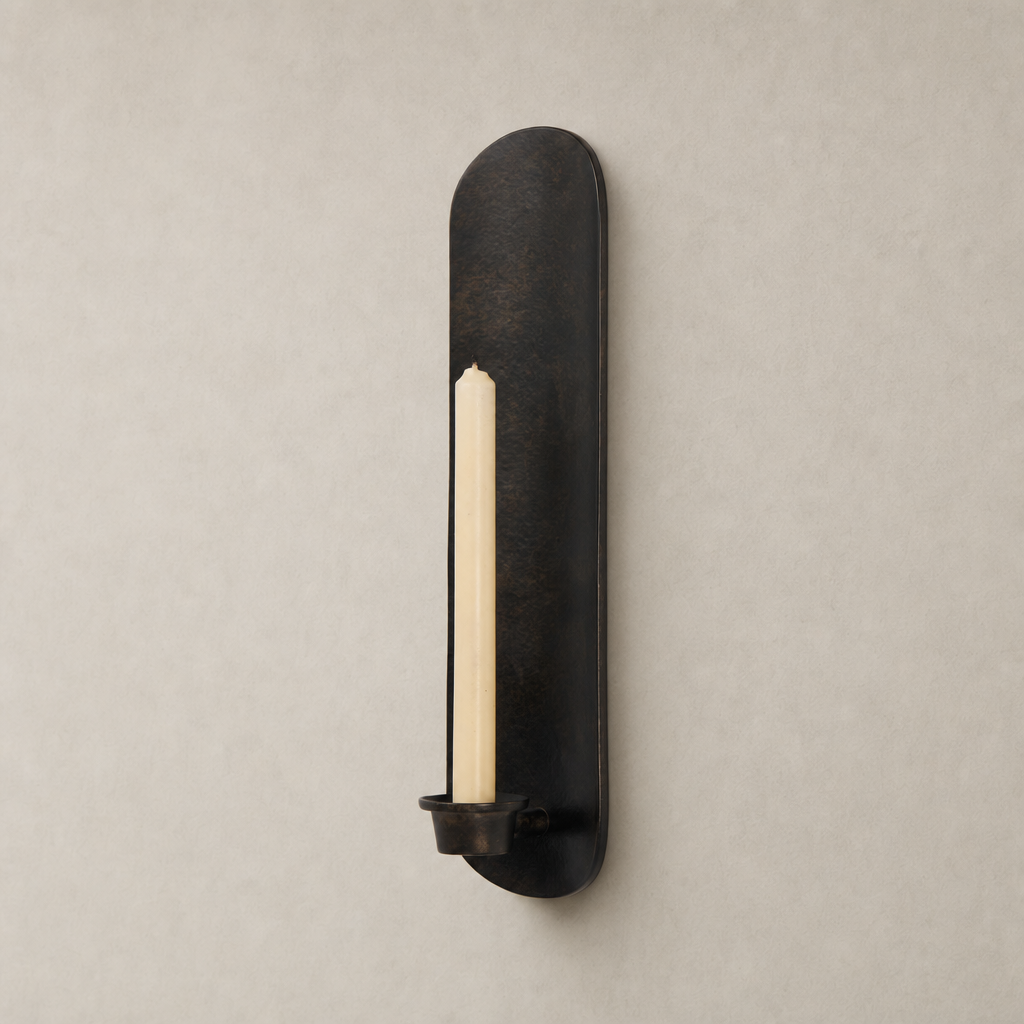 Zola Wall Mounted Candle Holder set in distressed bronze with elegant minimalist design.