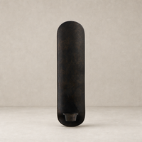 Zola Wall Mounted Candle Holder in distressed bronze with a sleek, elongated design.