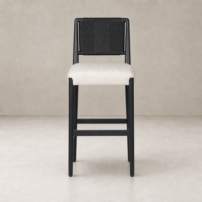 Kauri Bar + Counter Stool in Essence Natural, featuring a sleek design and textured backrest.