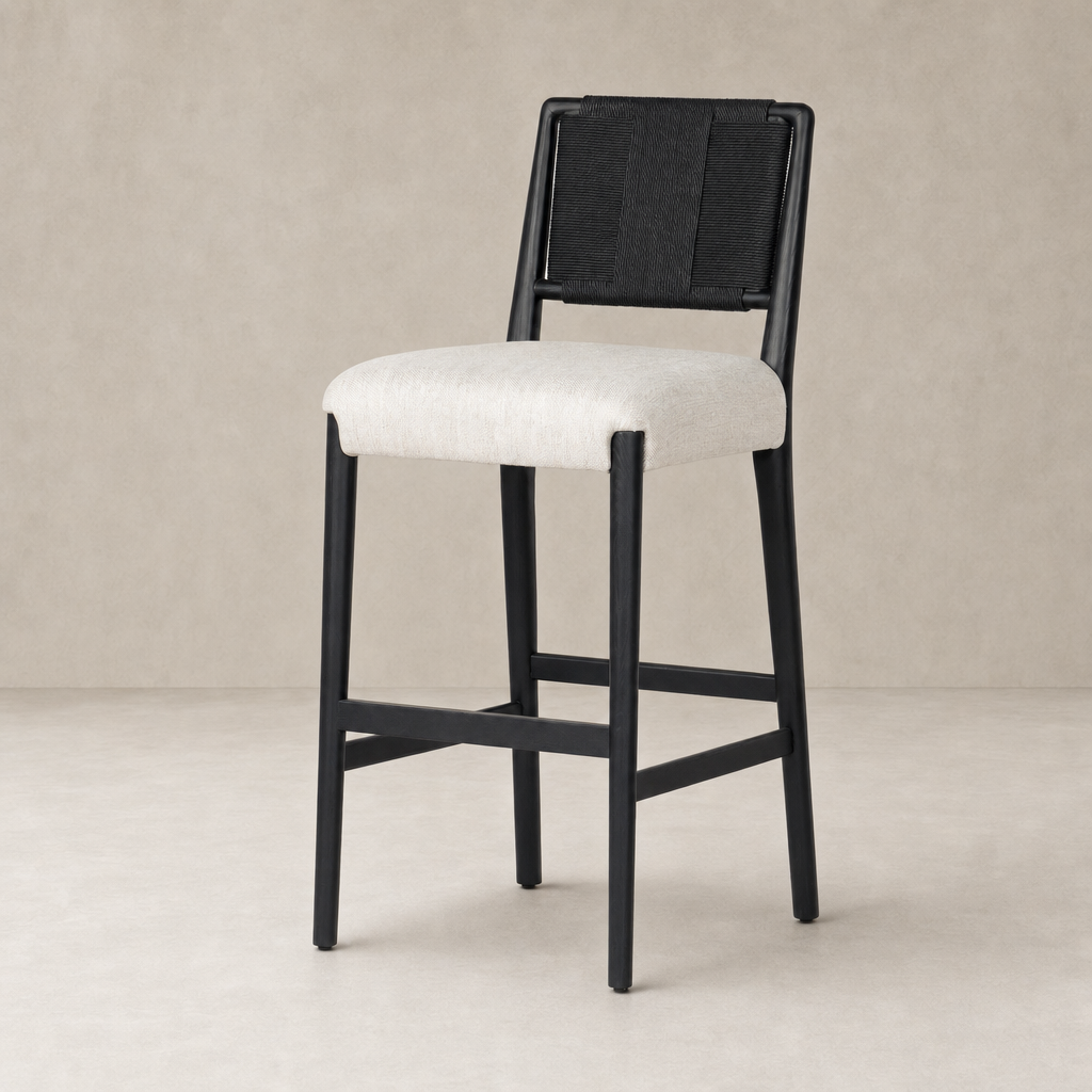 Kauri Bar + Counter Stool in Essence Natural with black frame and light fabric seat.