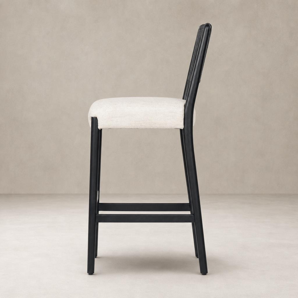 Kauri Bar + Counter Stool in Essence Natural with sleek design and comfortable upholstery.