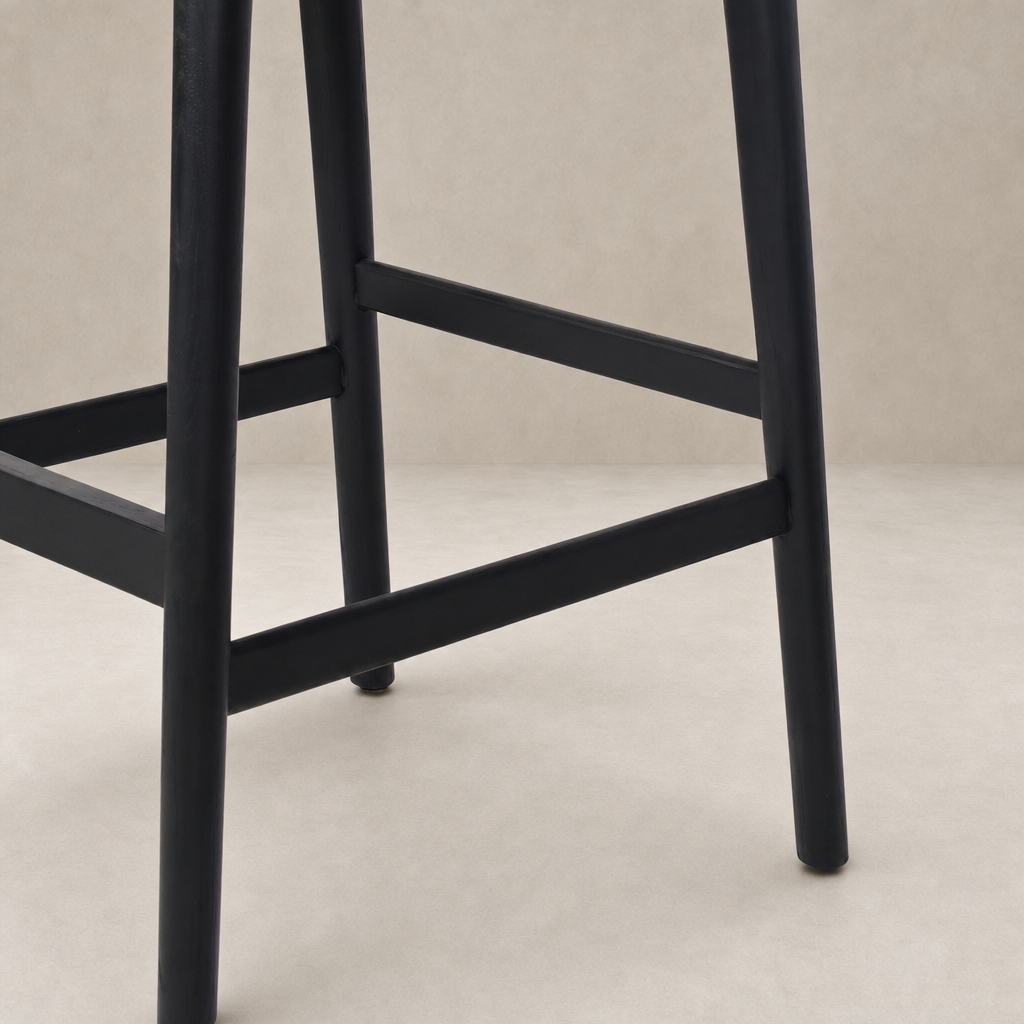 Kauri Bar + Counter Stool in Essence Natural with sturdy black legs and minimalist design.