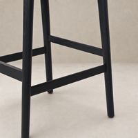 Kauri Bar + Counter Stool in Essence Natural with sturdy black legs and minimalist design.