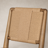 Kauri Bar + Counter Stool in Maestro Camel showcasing a woven backrest detail.