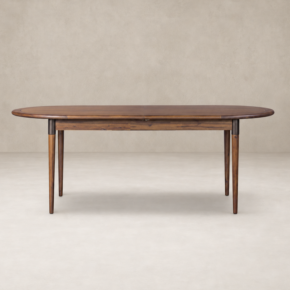 Cortina Oval Extension Dining Table in toasted walnut with sleek, modern design.