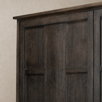 Close-up of Bristol Cabinet in Smoked Black showcasing the textured wood finish and sleek lines.