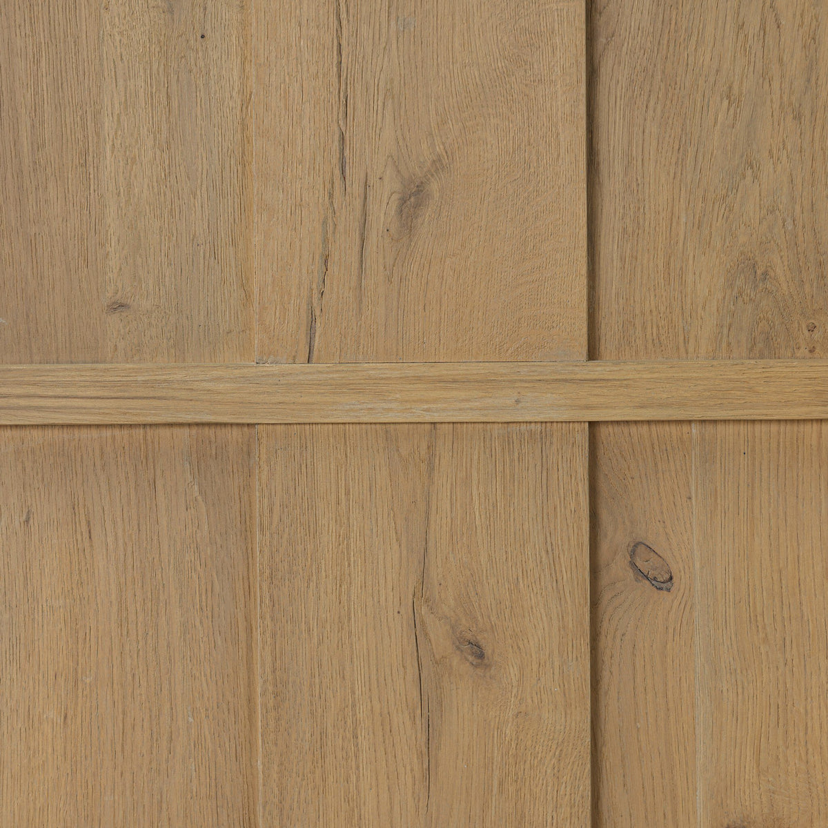 Close-up detail of Bristol Cabinet in aged natural oak showcasing rich wood grain texture.