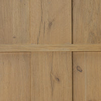 Close-up detail of Bristol Cabinet in aged natural oak showcasing rich wood grain texture.