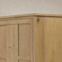 Close-up of Bristol Cabinet showcasing its Aged Natural Oak texture and finish.