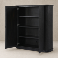 Kanoa Cabinet in black linen featuring sleek curves and spacious interior shelves.