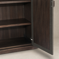 Kanoa Cabinet in dark green lacquered linen with spacious interior shelves.