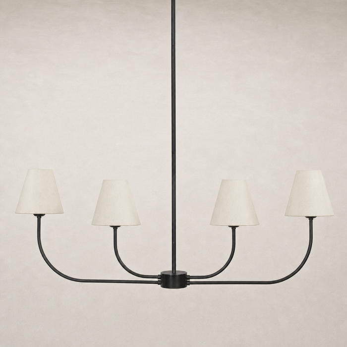 Linear chandelier in natural bronze with four fabric shades and a sleek design.