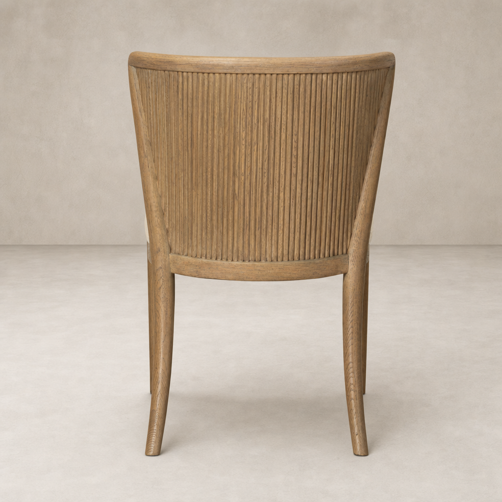 Skye Dining Chair in Irving Flax with ribbed wooden back and tapered legs.